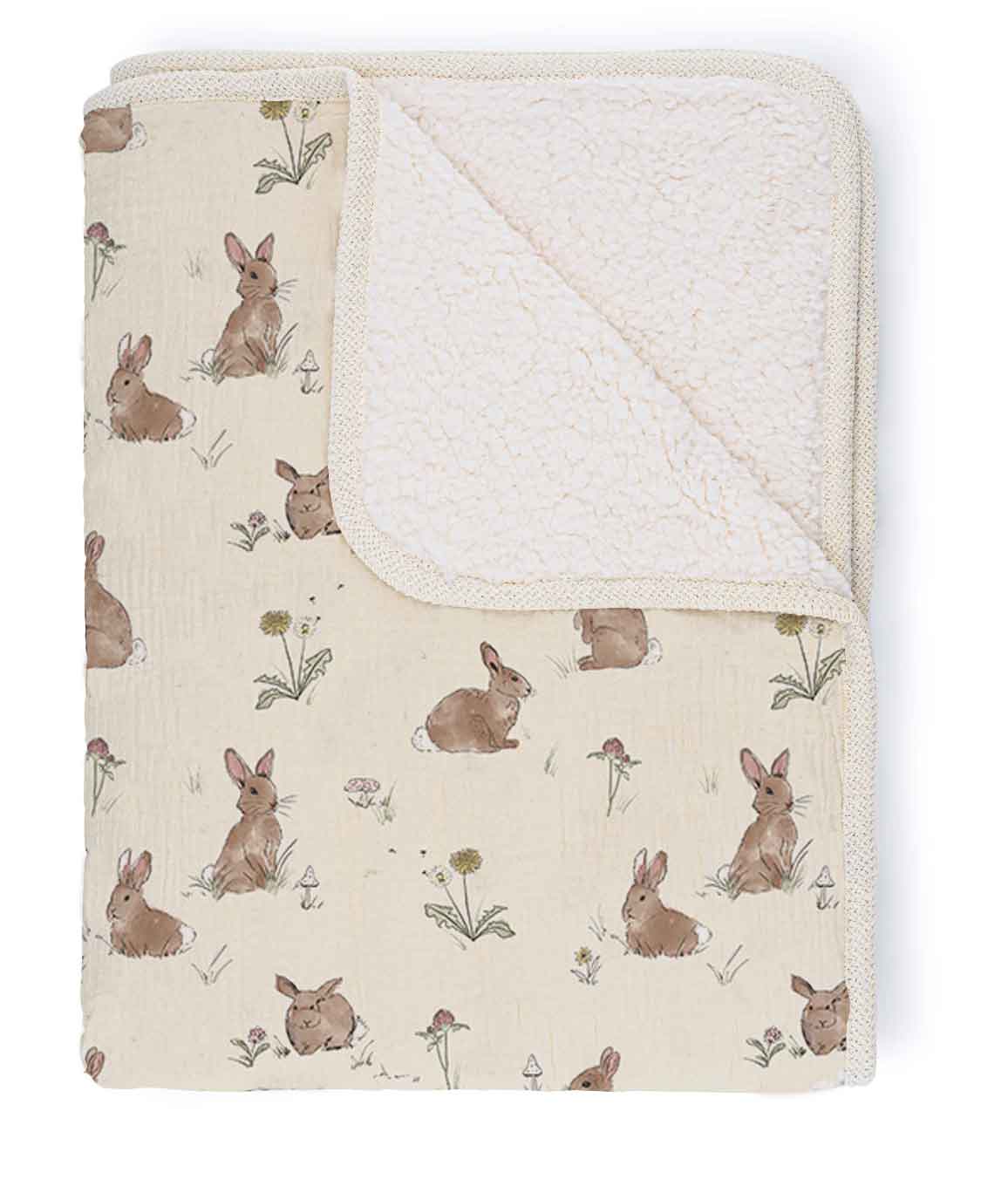 Baby blanket with rabbit pattern on a white background