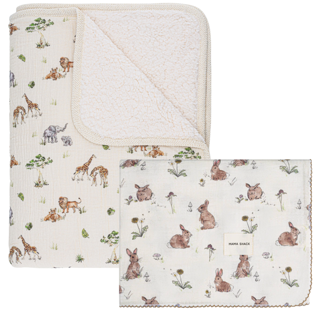 Baby blanket with animal pattern and matching square item on a white background