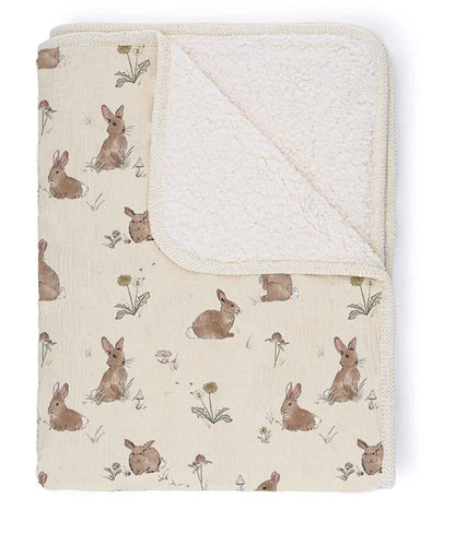 Baby blanket with rabbit pattern on a white background
