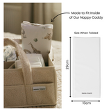 Nappy caddy with folded product labeled 'Mama Shack' and dimensions displayed.
